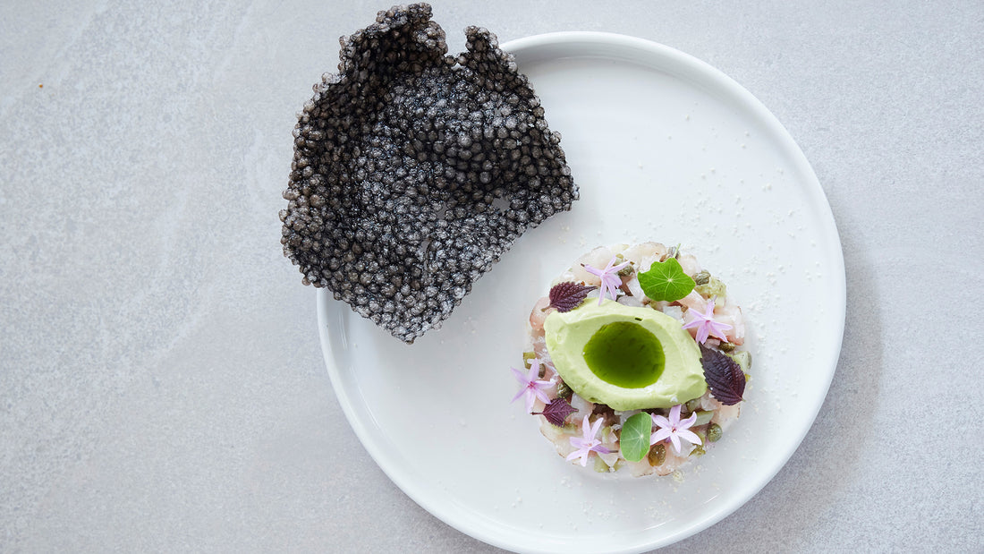 Recipe: Kingfish tartare with avocado mousse & squid ink crackers by Simon Sandall